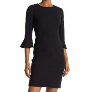 Donna Morgan navy sheath dress with 3/4 sleeve and bell ruffle - size 2 NWT